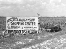Billboard leading to Cocoa Beach advertises  Missile Town Shopping Center Coming Soon